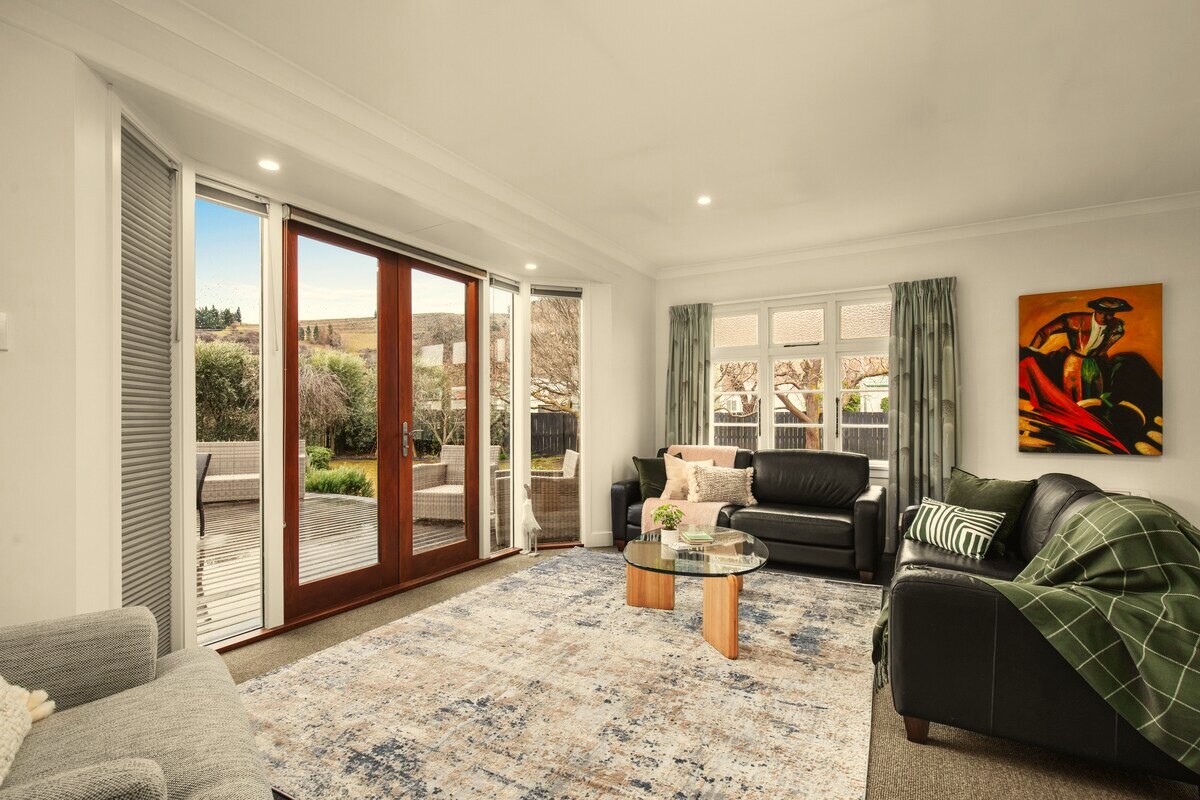 Modern lounge opening to the garden